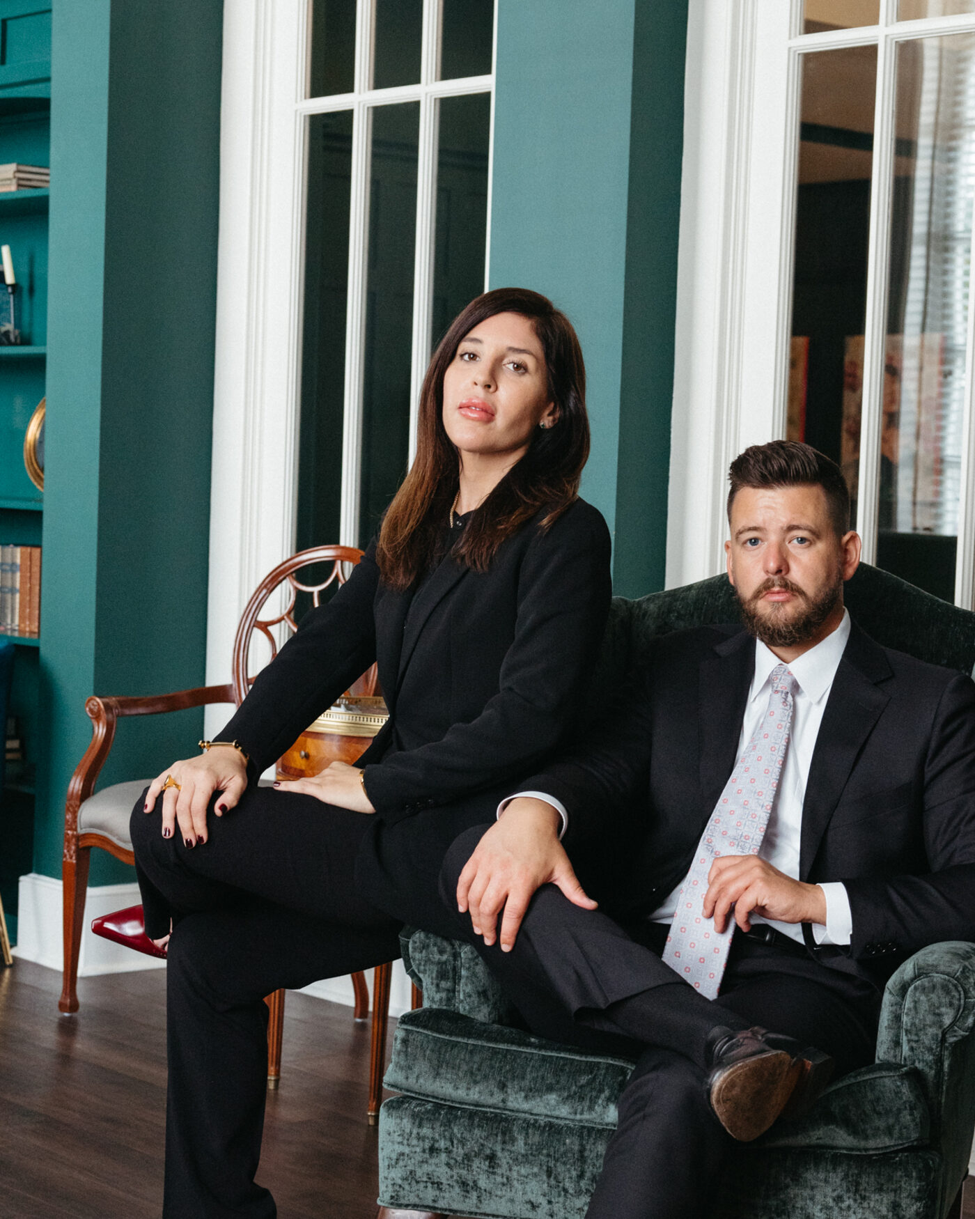 Attorneys Nicole N. Sanchez and Tyler K. Vaughn of Sanchez Vaughn, Trial Lawyers, seated in their Tampa office.